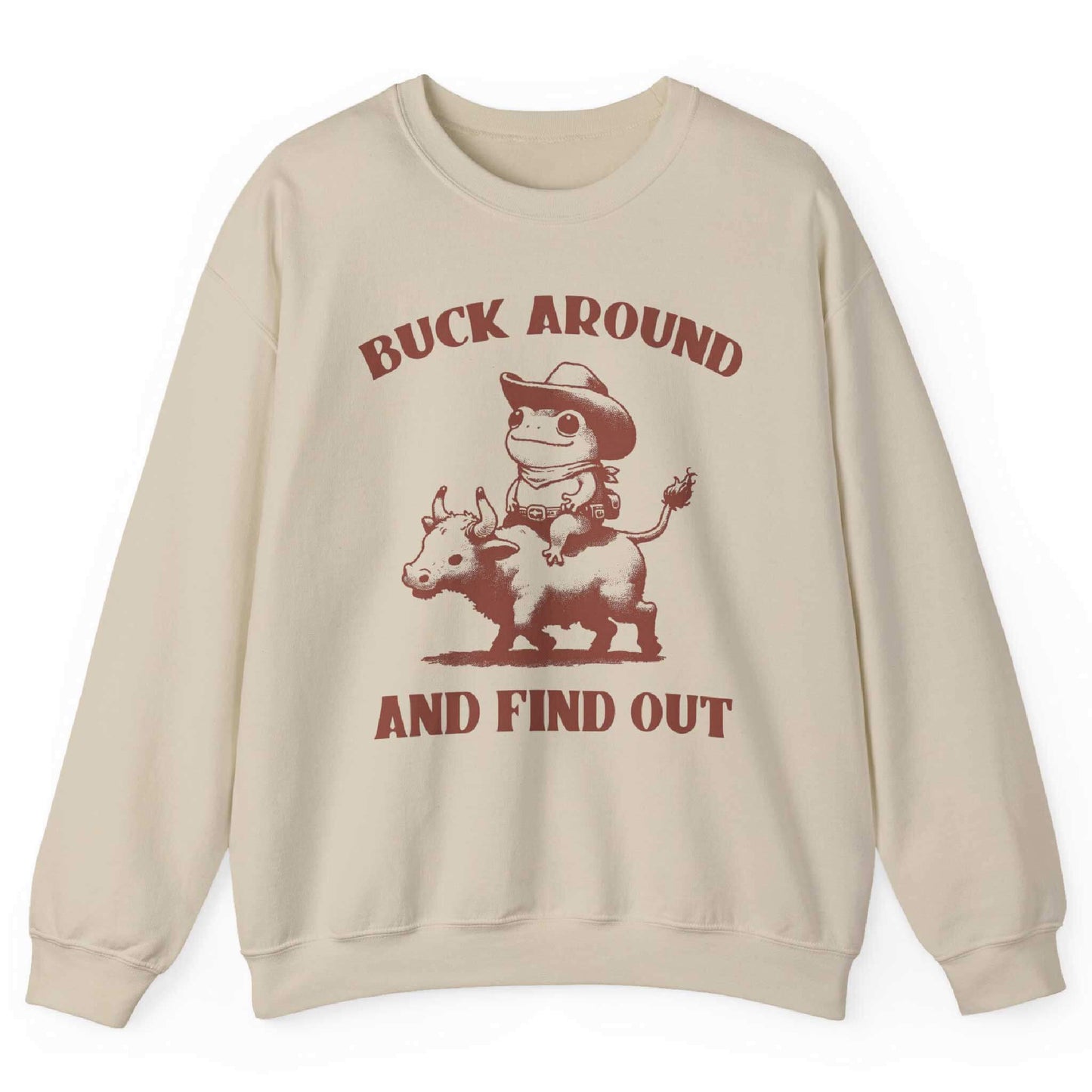 Sand sweatshirt with cowboy frog riding bull and “Buck Around and Find Out” text – front view, by Shirtcasm