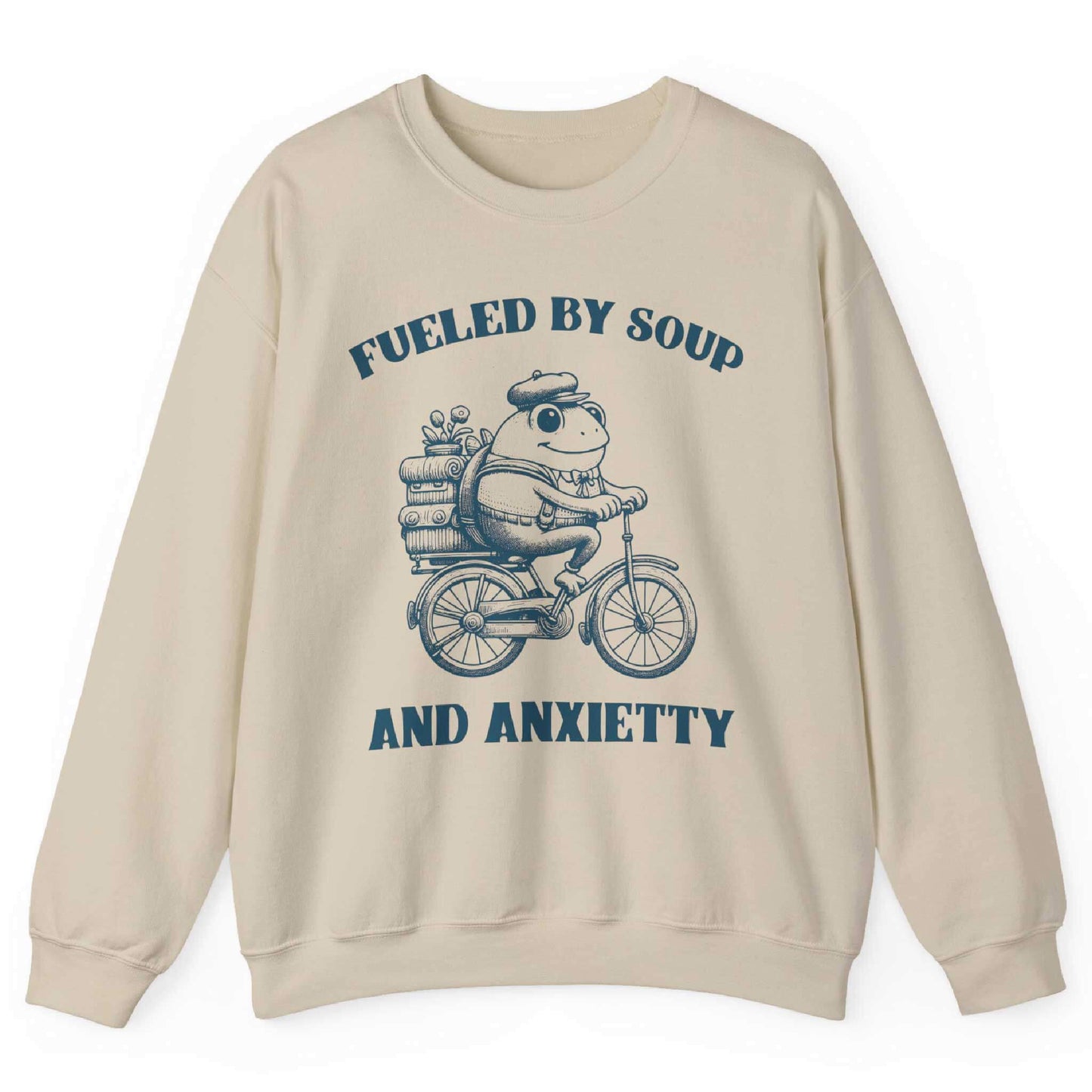 Sand sweatshirt with frog riding bicycle carrying soup cans and “Fueled by Soup and Anxiety” text – front view, by Shirtcasm