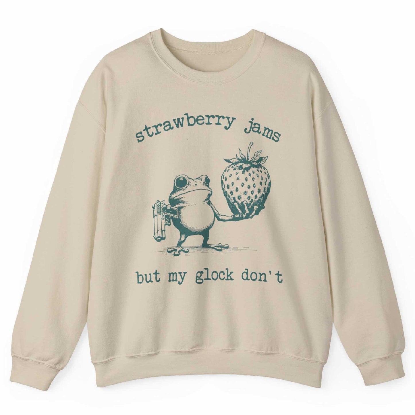Sand sweatshirt with frog holding strawberry and “Strawberry Jams But My Glock Don’t” text – front view, by Shirtcasm
