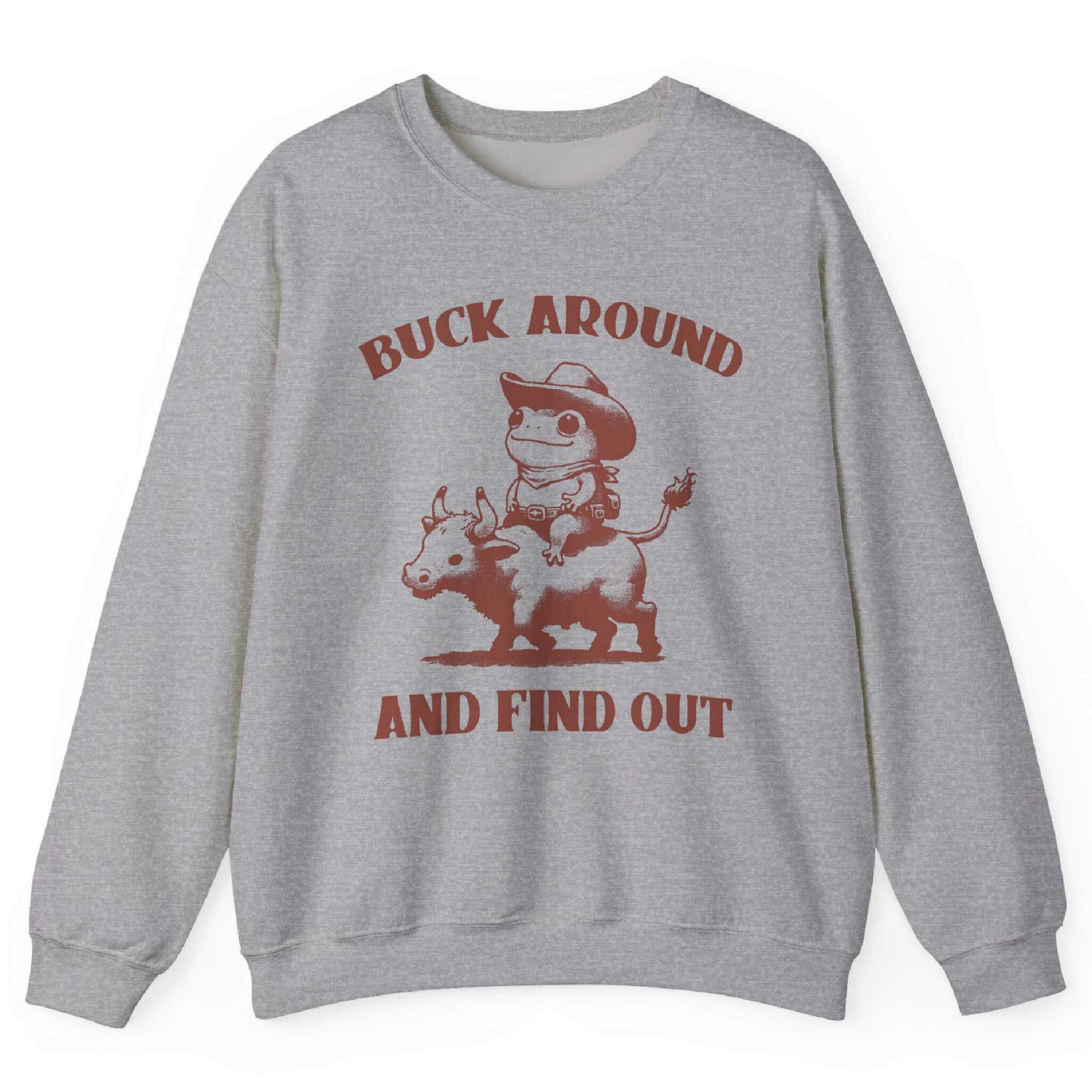 Sport Grey sweatshirt with cowboy frog riding bull and “Buck Around and Find Out” text – front view, by Shirtcasm