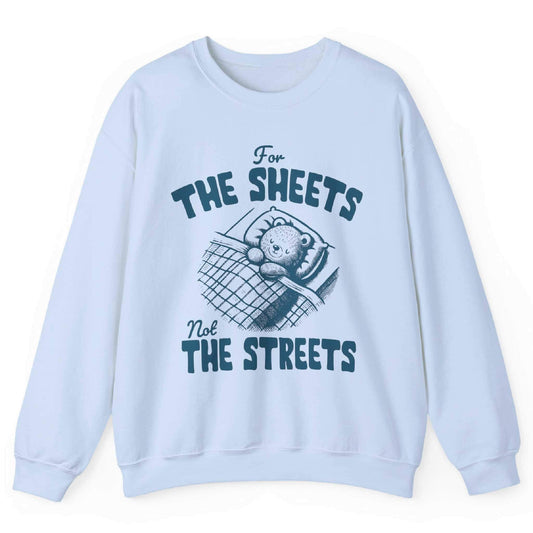 Light blue sweatshirt with bear tucked in bed and “For the Sheets Not the Streets” text – front view, by Shirtcasm