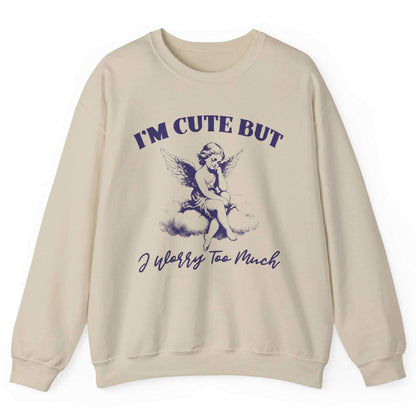 Sand sweatshirt with angel on a cloud and “I’m Cute But I Worry Too Much” text – front view, by Shirtcasm